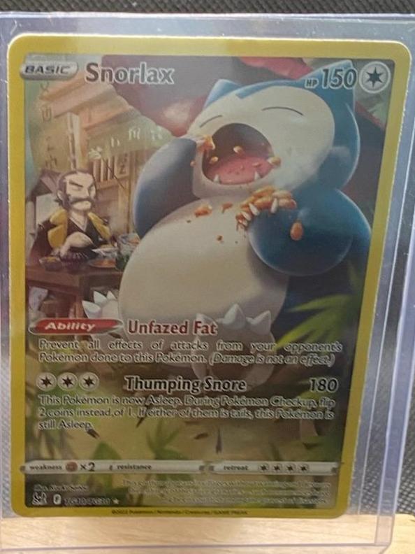 Lost Origin Trainer Gallery Snorlax card #TG10/TG30 in protective sleeve.