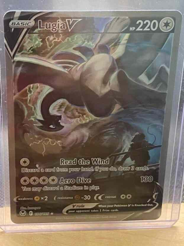 Silver Tempest #186/195 Lugia V alternate full art collectible card in protective case.