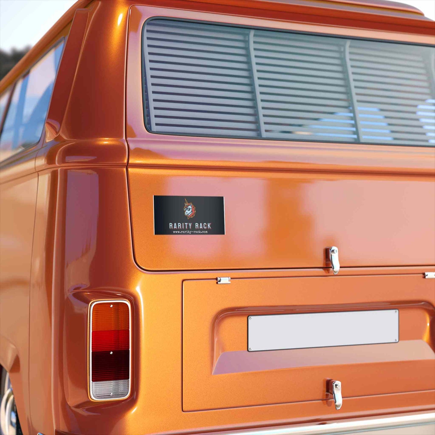 Premium vinyl bumper sticker on orange van, durable and waterproof for indoor and outdoor use.