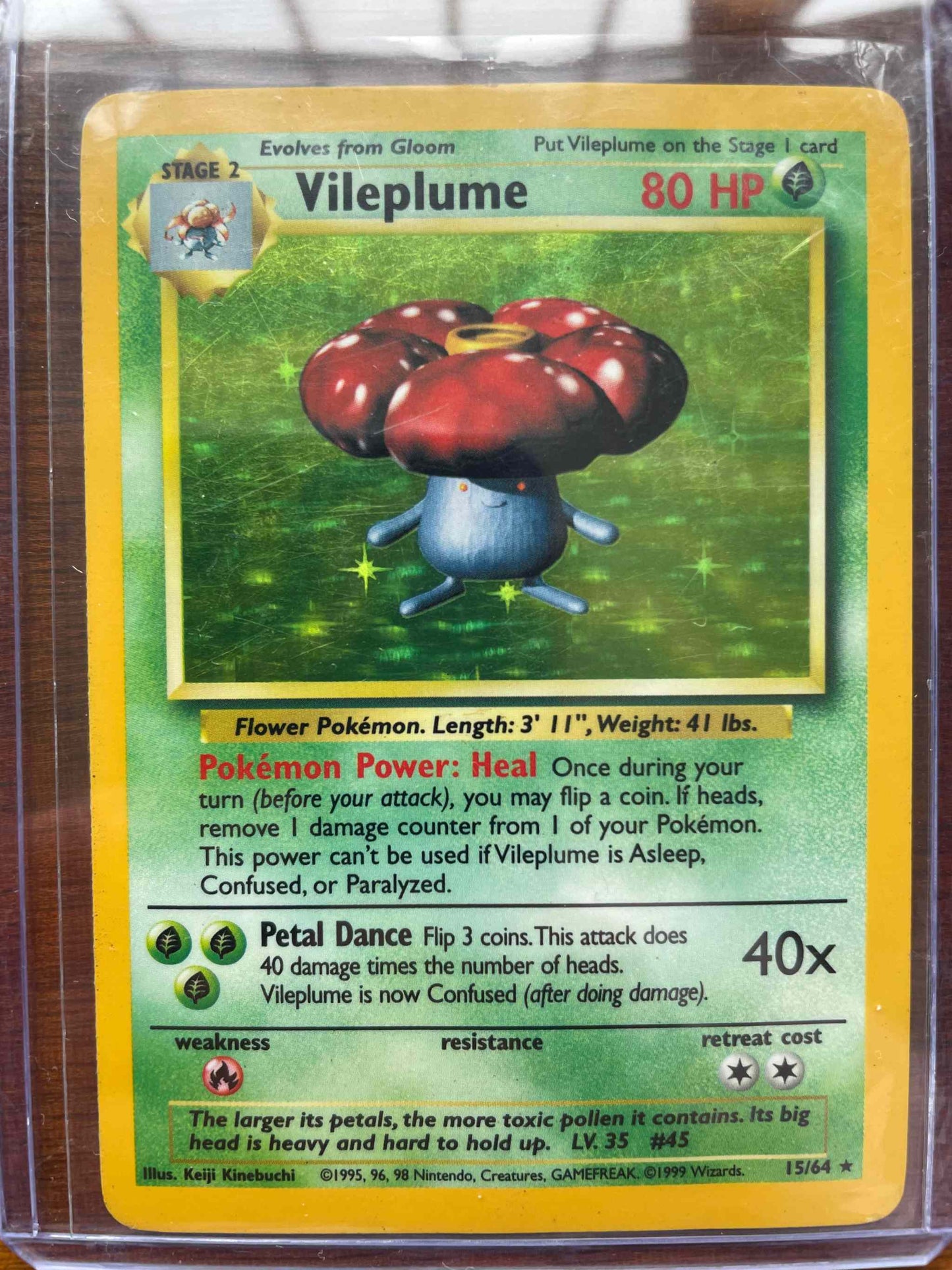 Jungle #15/64 Vileplume Pokémon card showcasing jungle-themed design and powerful abilities.