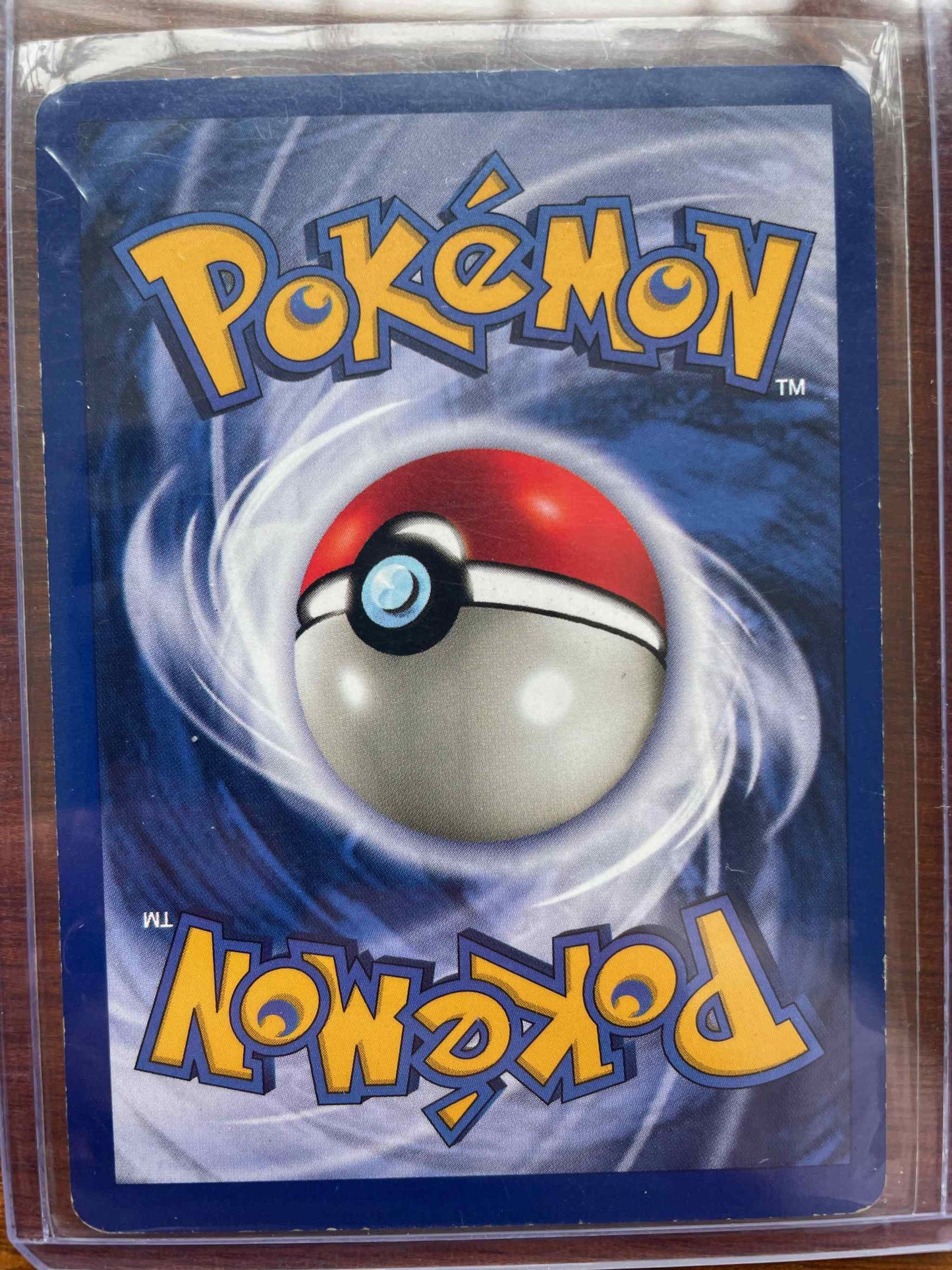 Pokemon Base Set 2 Ninetales card with holographic finish and intricate design.