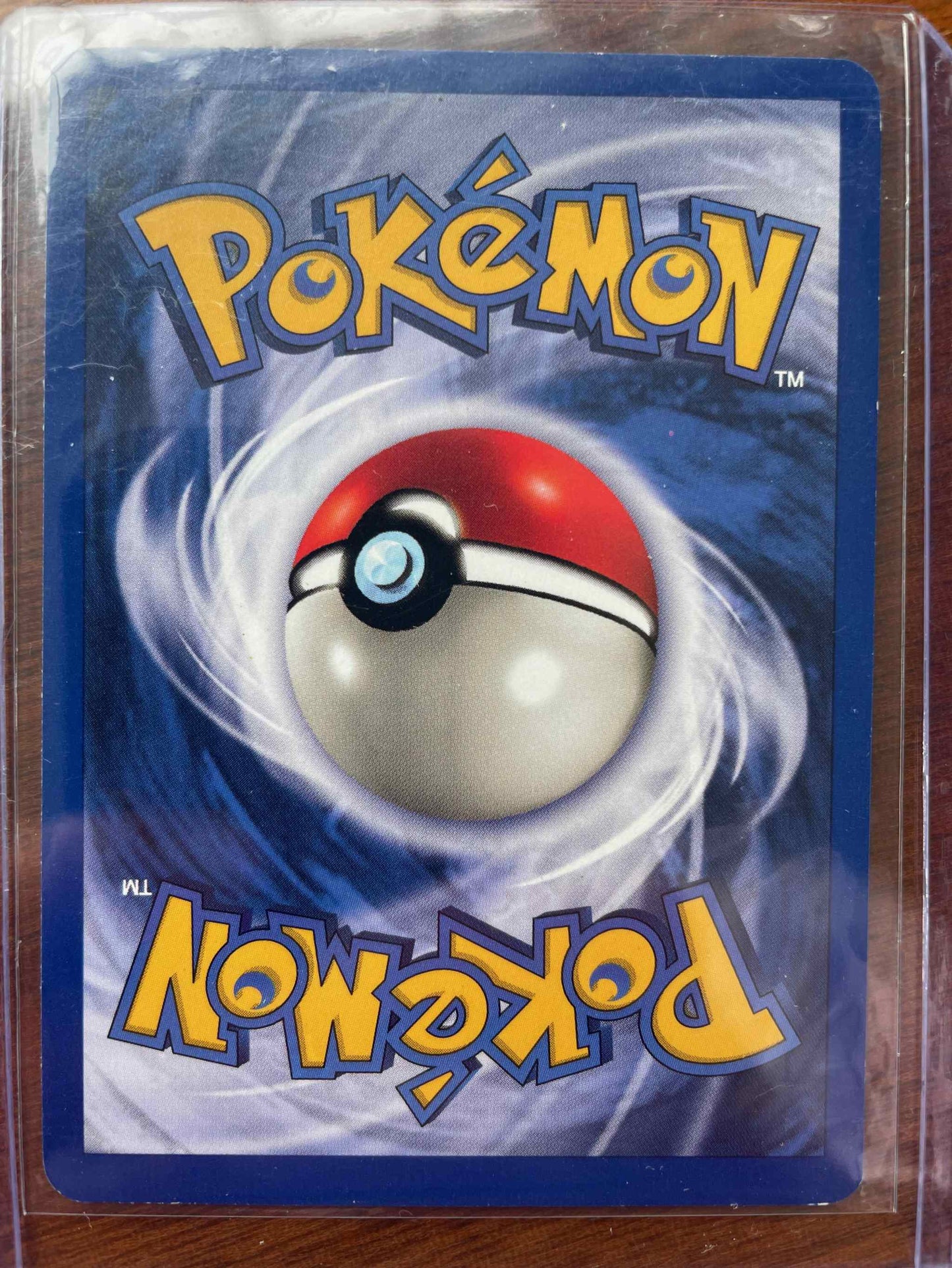 Rare Base Set Alakazam Pokémon card featuring psychic abilities.
