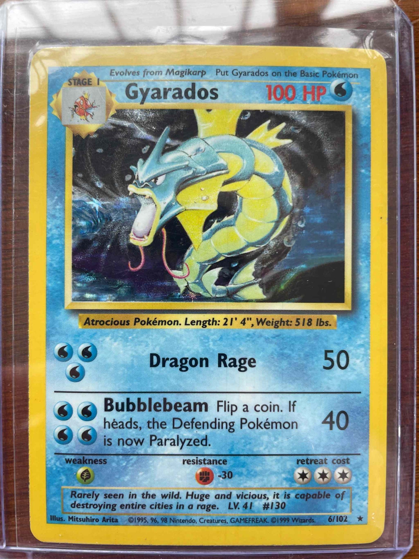 Base Set 006/102 Gyarados Pokémon card, original design, valuable collectible.