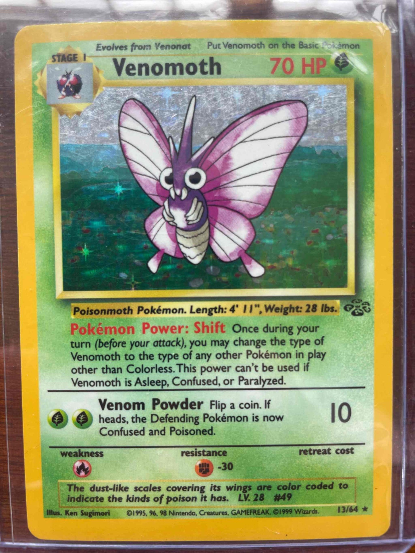 Jungle #13/64 Venomoth Pokémon trading card with jungle-themed design.