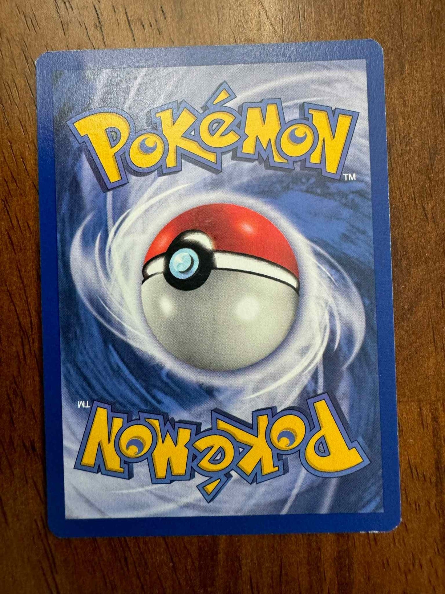 Base Set #023/102 Arcanine collectible Pokémon card with iconic artwork.