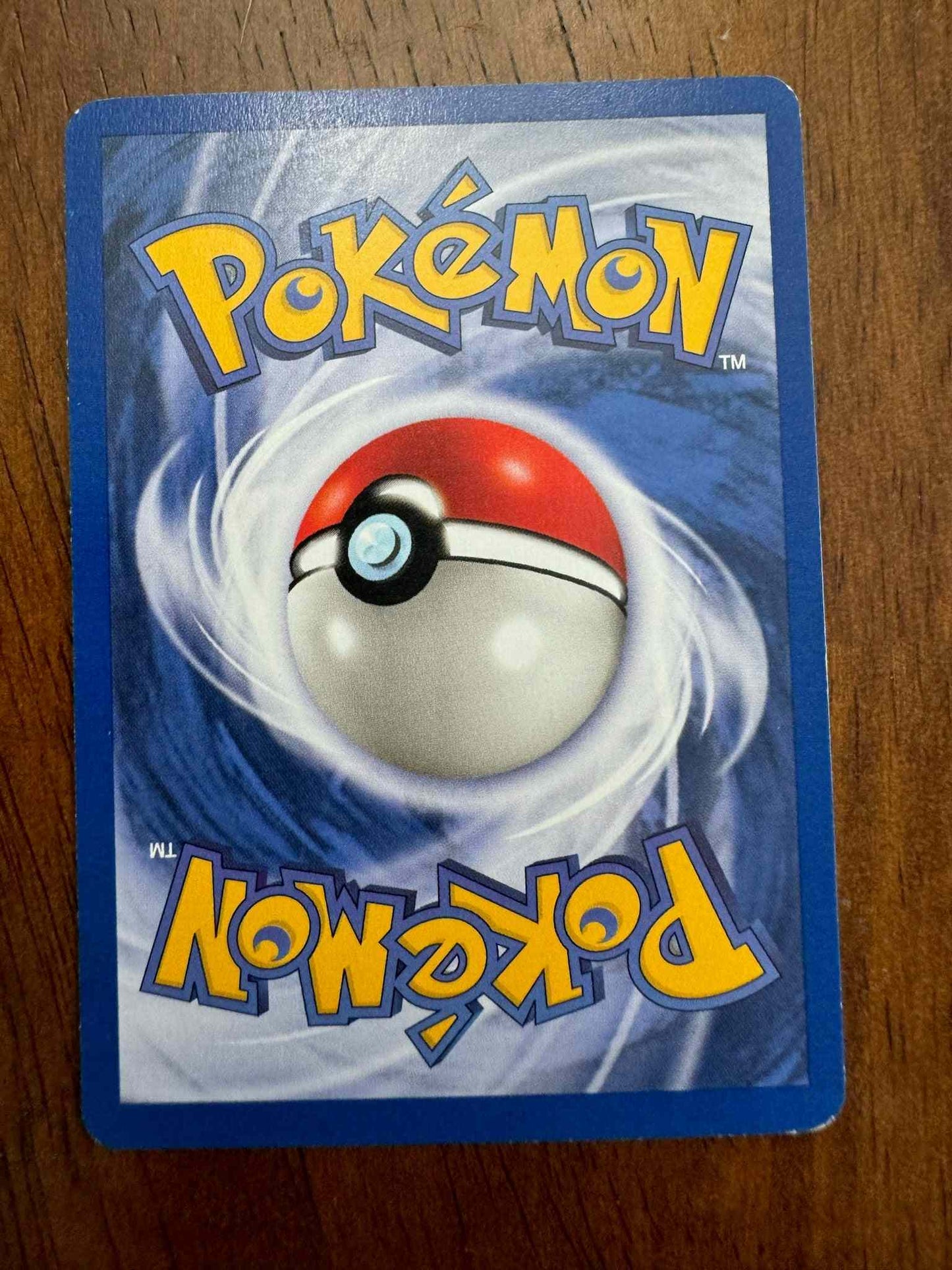 Team Rocket #61/82 Mankey Pokémon card featuring intricate artwork.