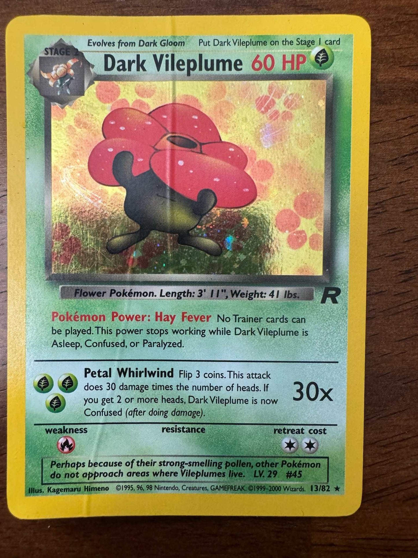 Team Rocket #13/82 Dark Vileplume (13) Pokemon card featuring a menacing design.