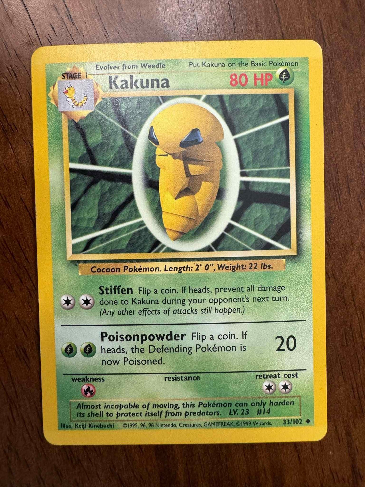 Base Set 033/102 Kakuna card with high defense and unique abilities.