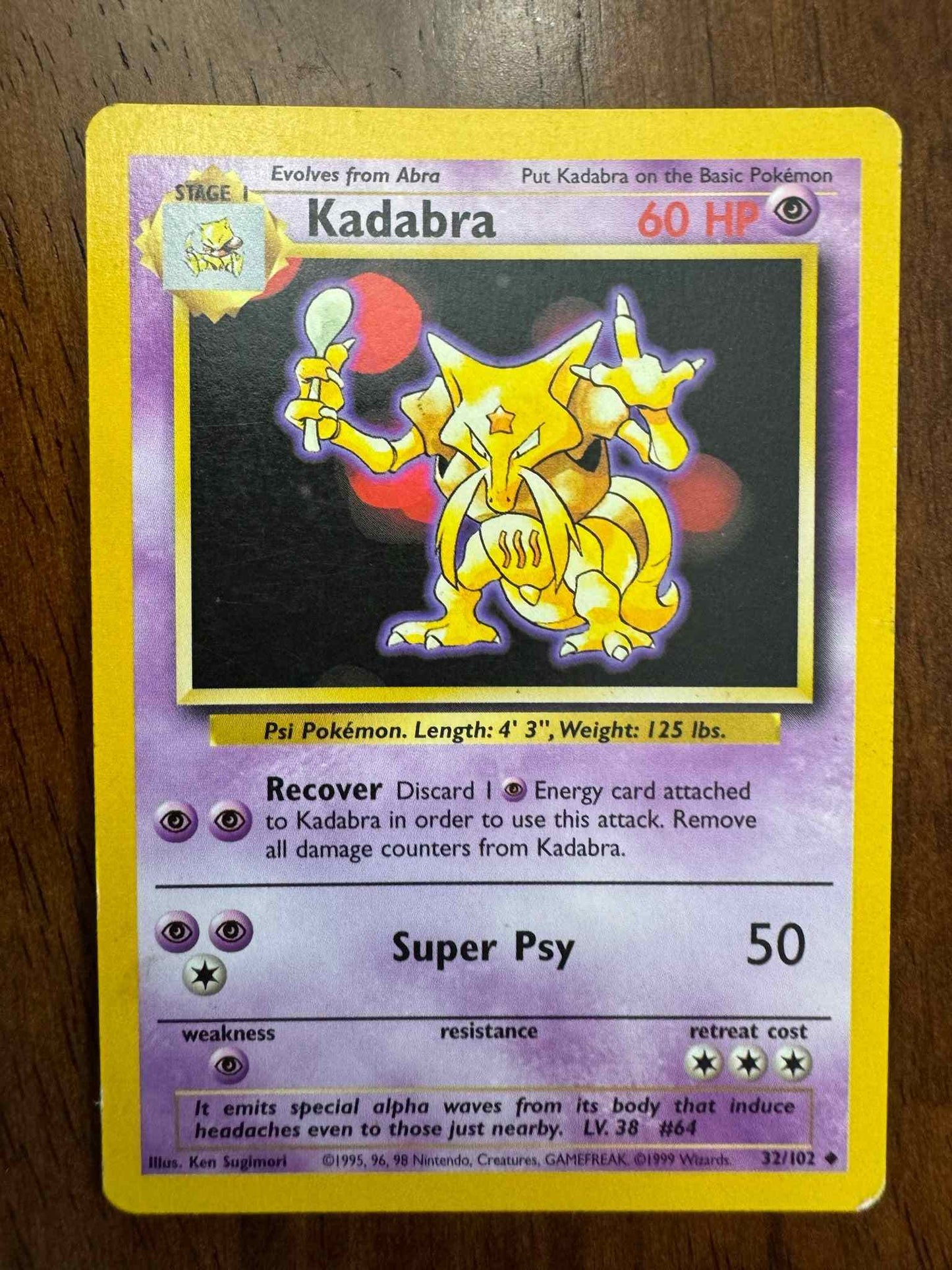 Base Set 032/102 Kadabra collectible Pokémon card with unique design and abilities.