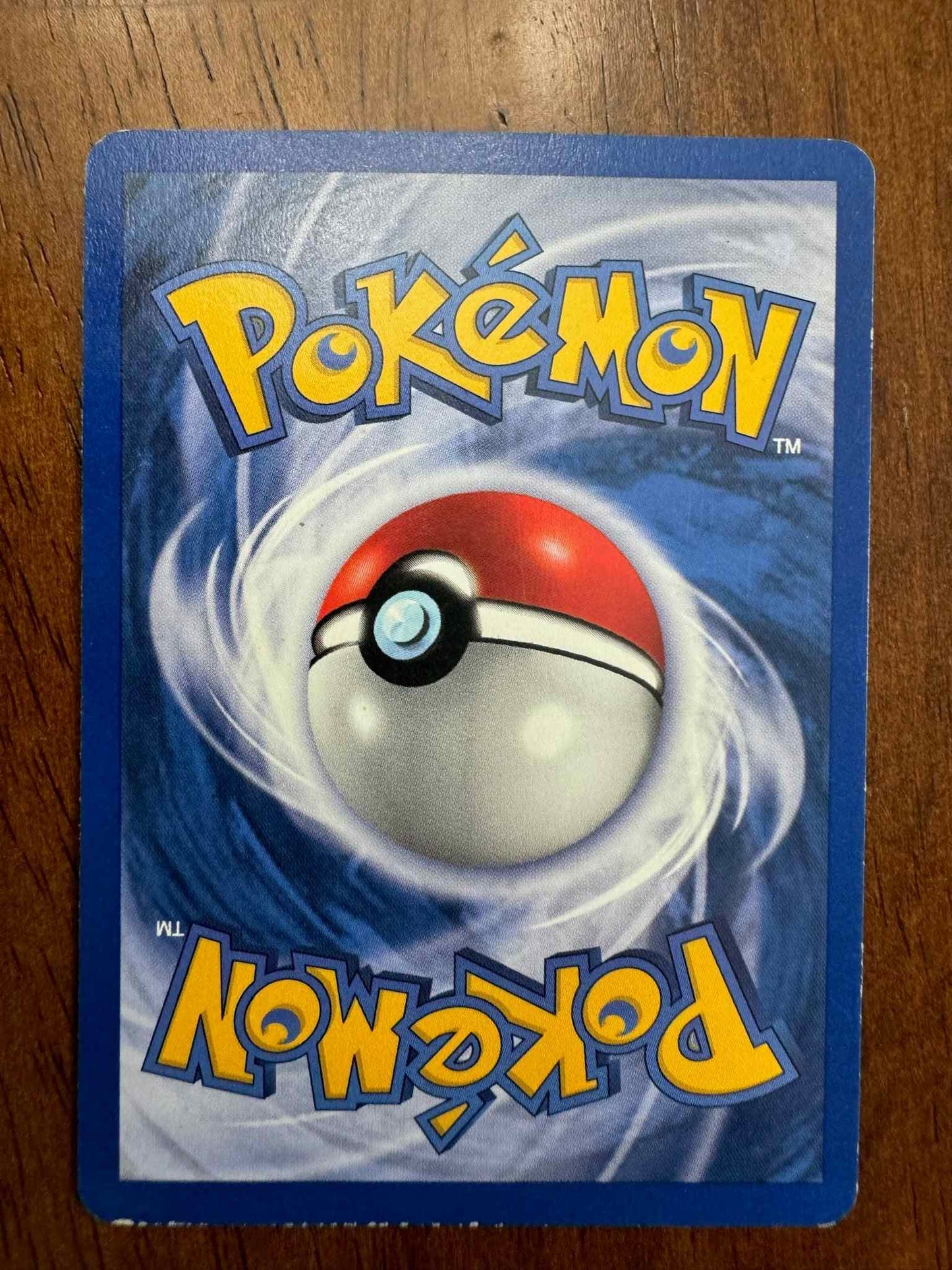 Base Set #034/102 Machoke Pokemon card featuring Fighting-type character.