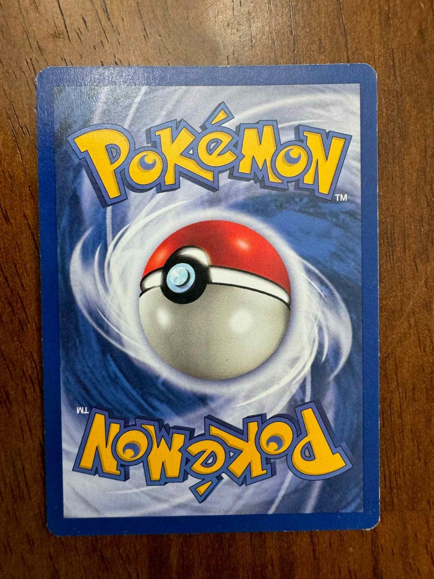 Base Set #038/102 Poliwhirl Pokémon card, collectible item.