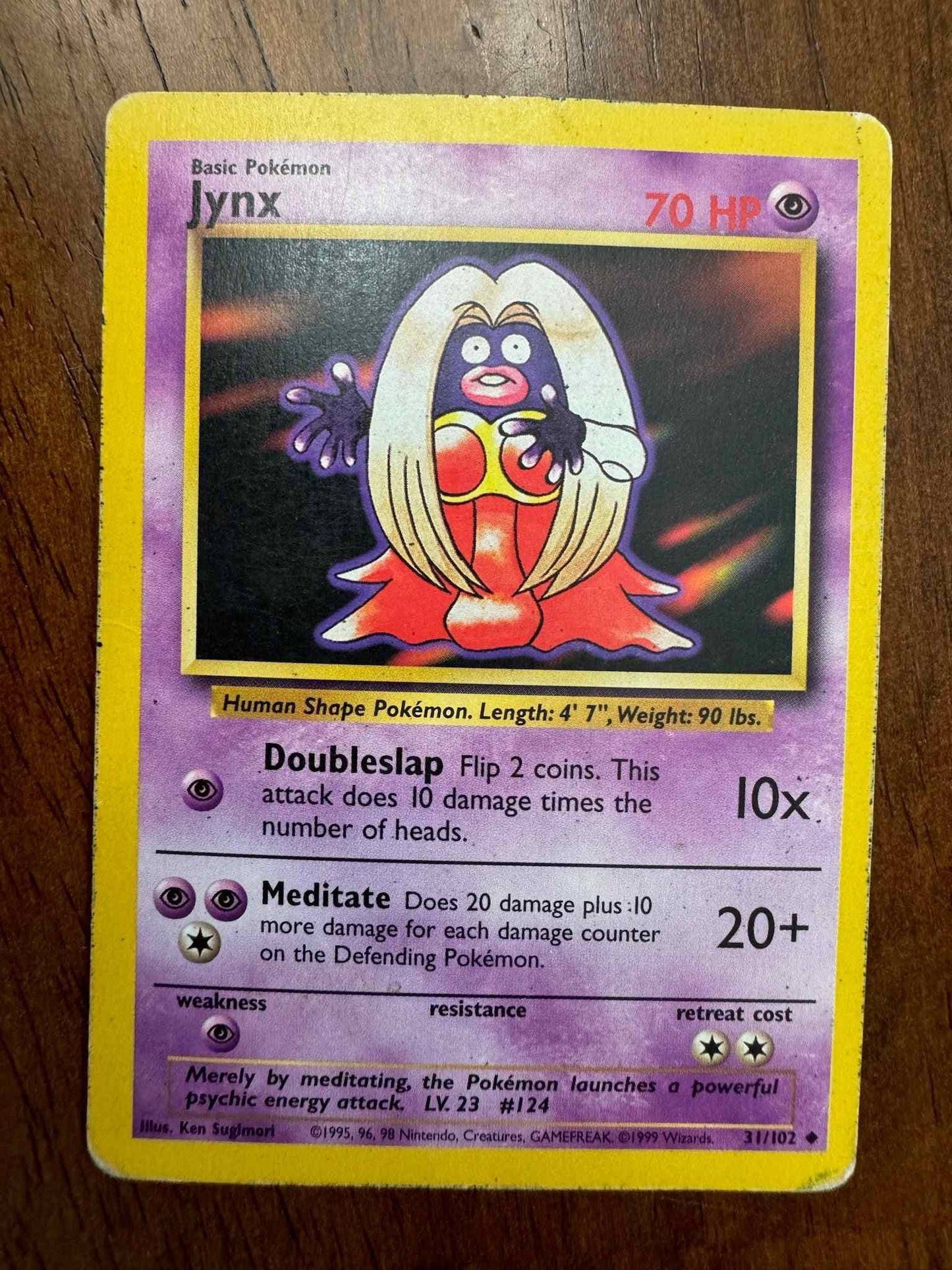 Base Set #031/102 Jynx Pokémon card with iconic design and stats.