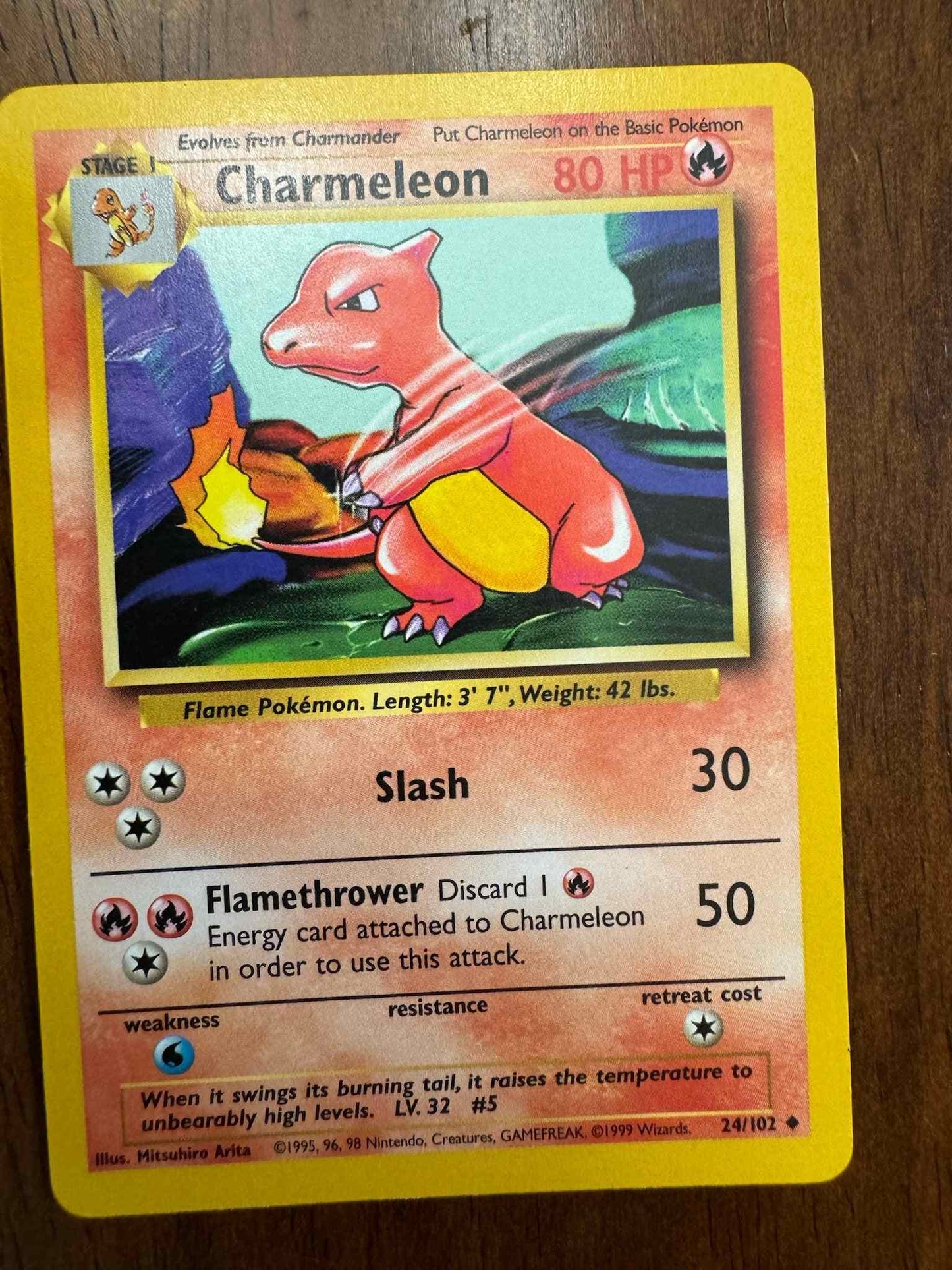 Base Set #024/102 Charmeleon Pokémon card with striking artwork and abilities.