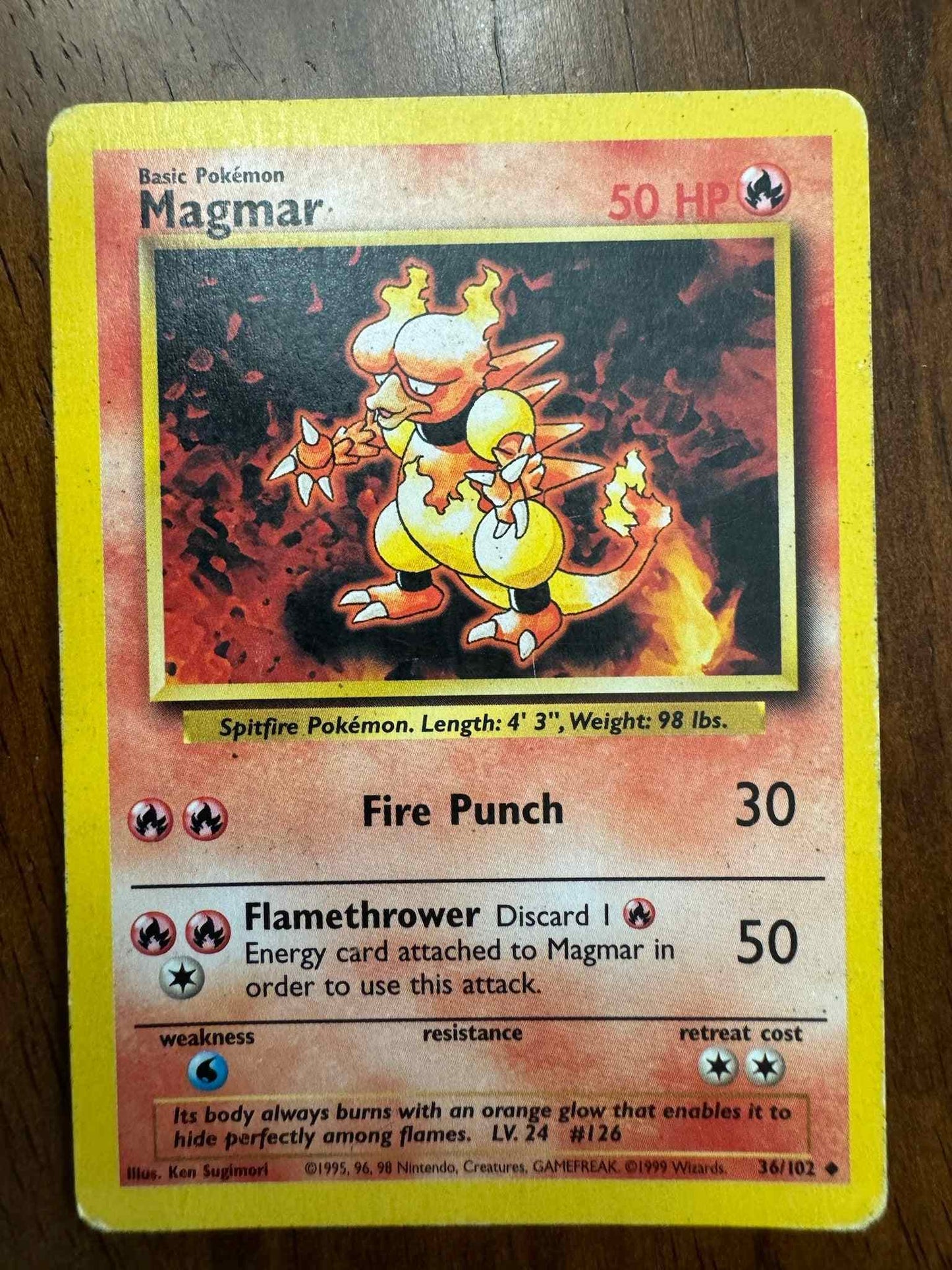 Base Set #036/102 Magmar Pokémon card with iconic design.