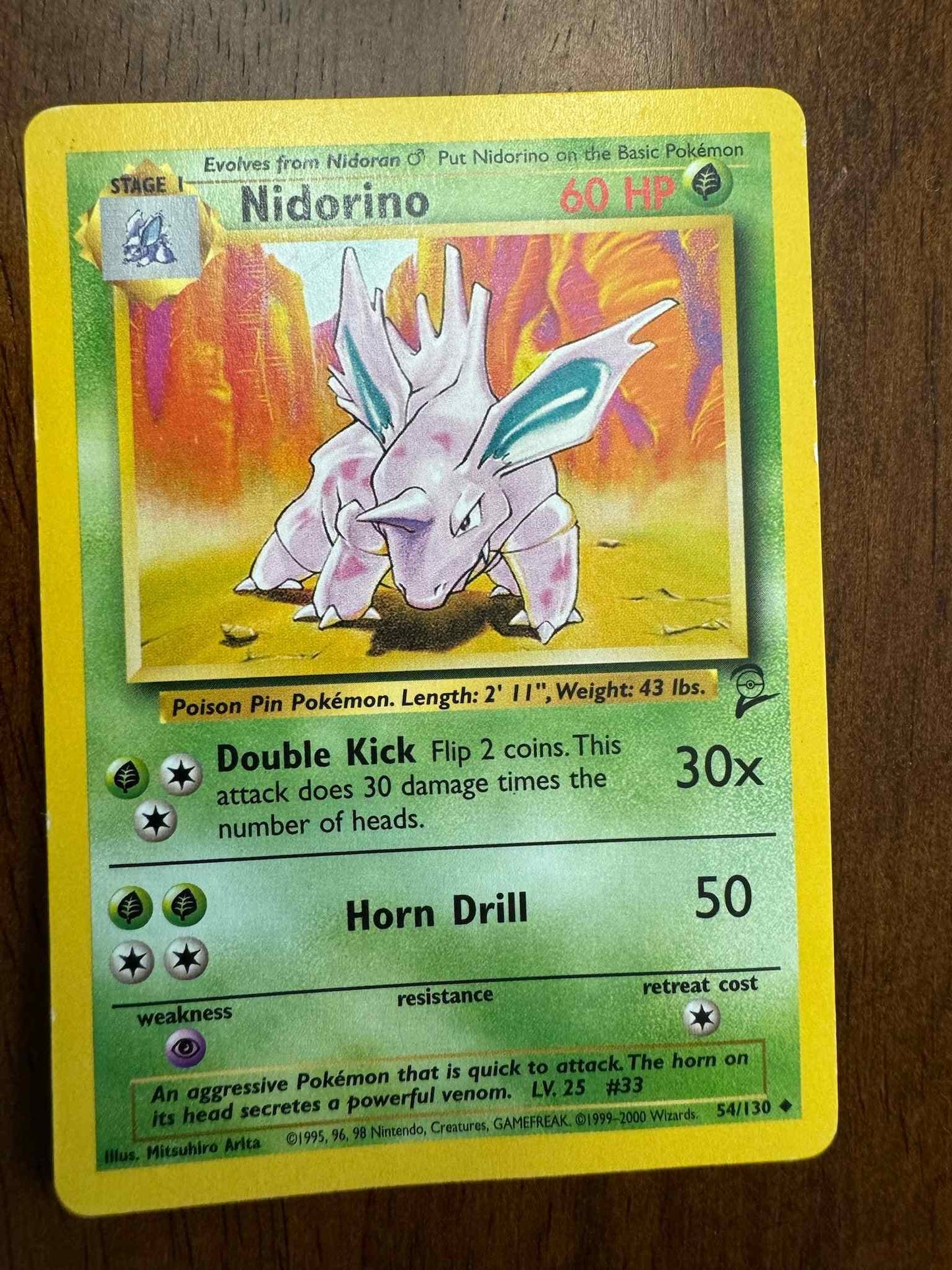 Base Set 2 #054/130 Nidorino collectible card with foil design and impressive stats for Pokemon TCG enthusiasts.