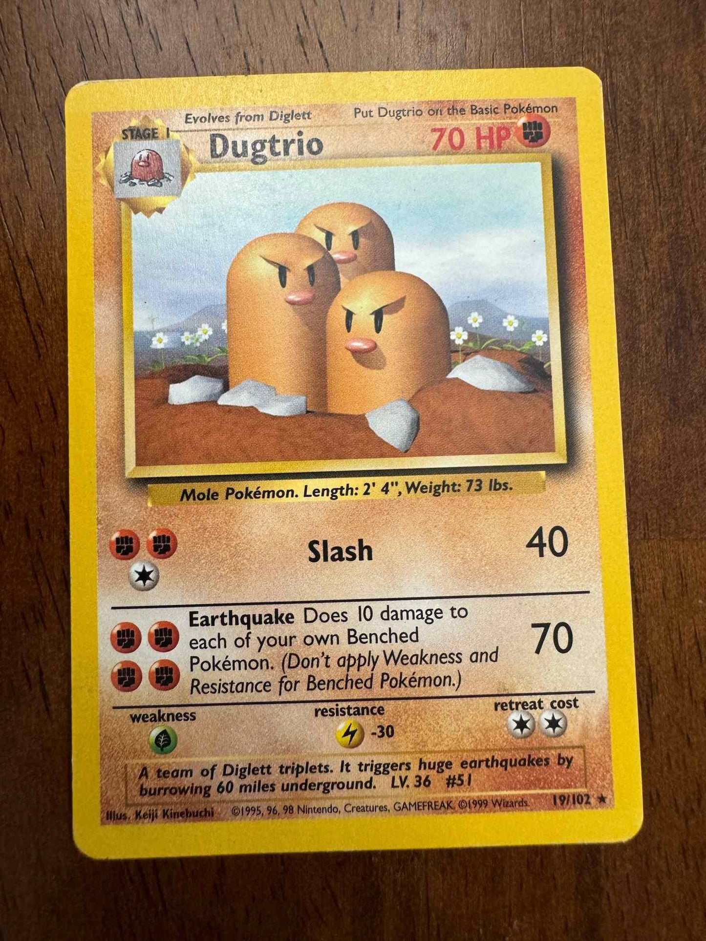 Base Set #019/102 Dugtrio collectible card showcasing Dugtrio's power and stats.