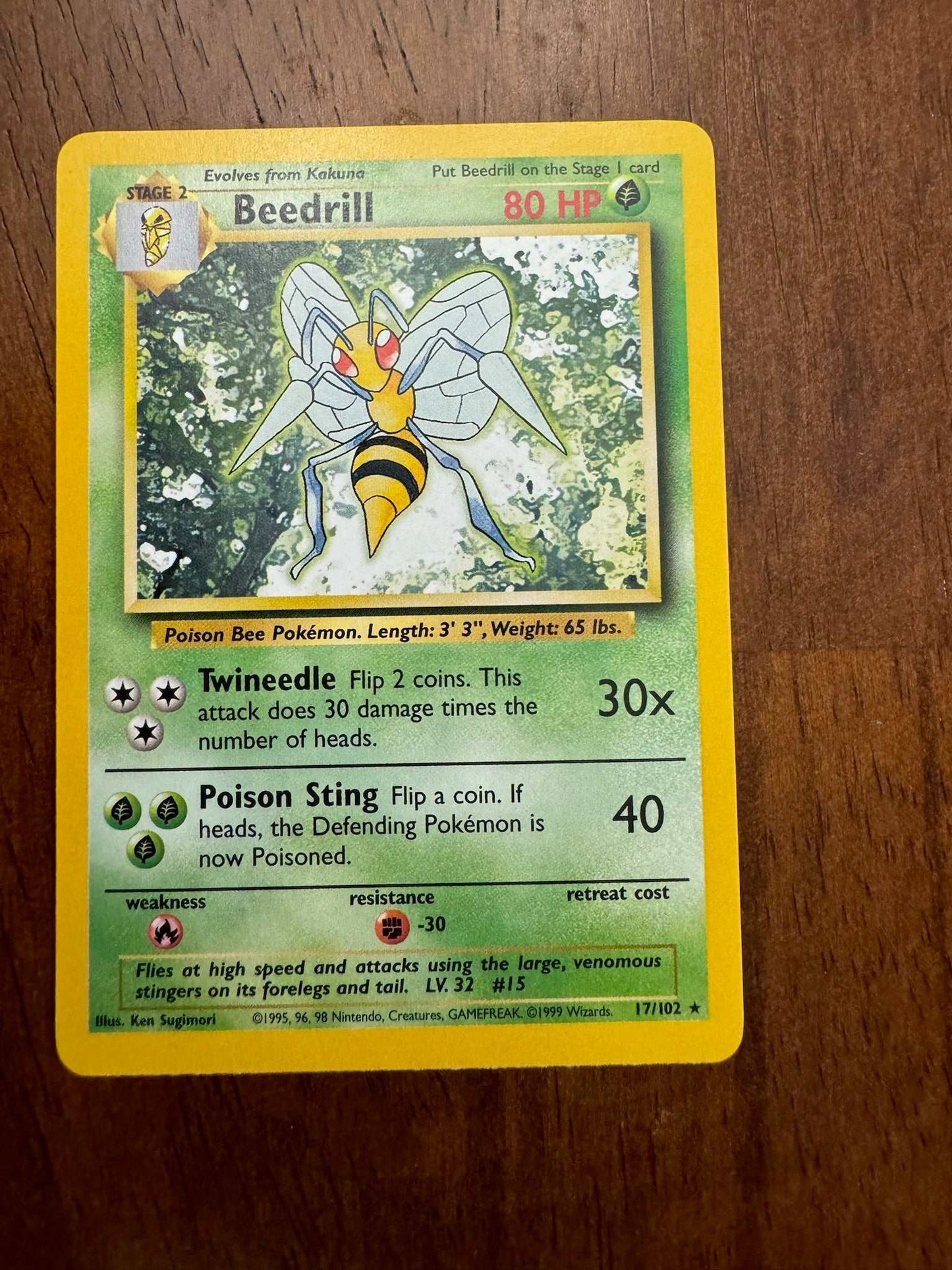 Base Set #017/102 Beedrill Pokémon card with original artwork and yellow border.