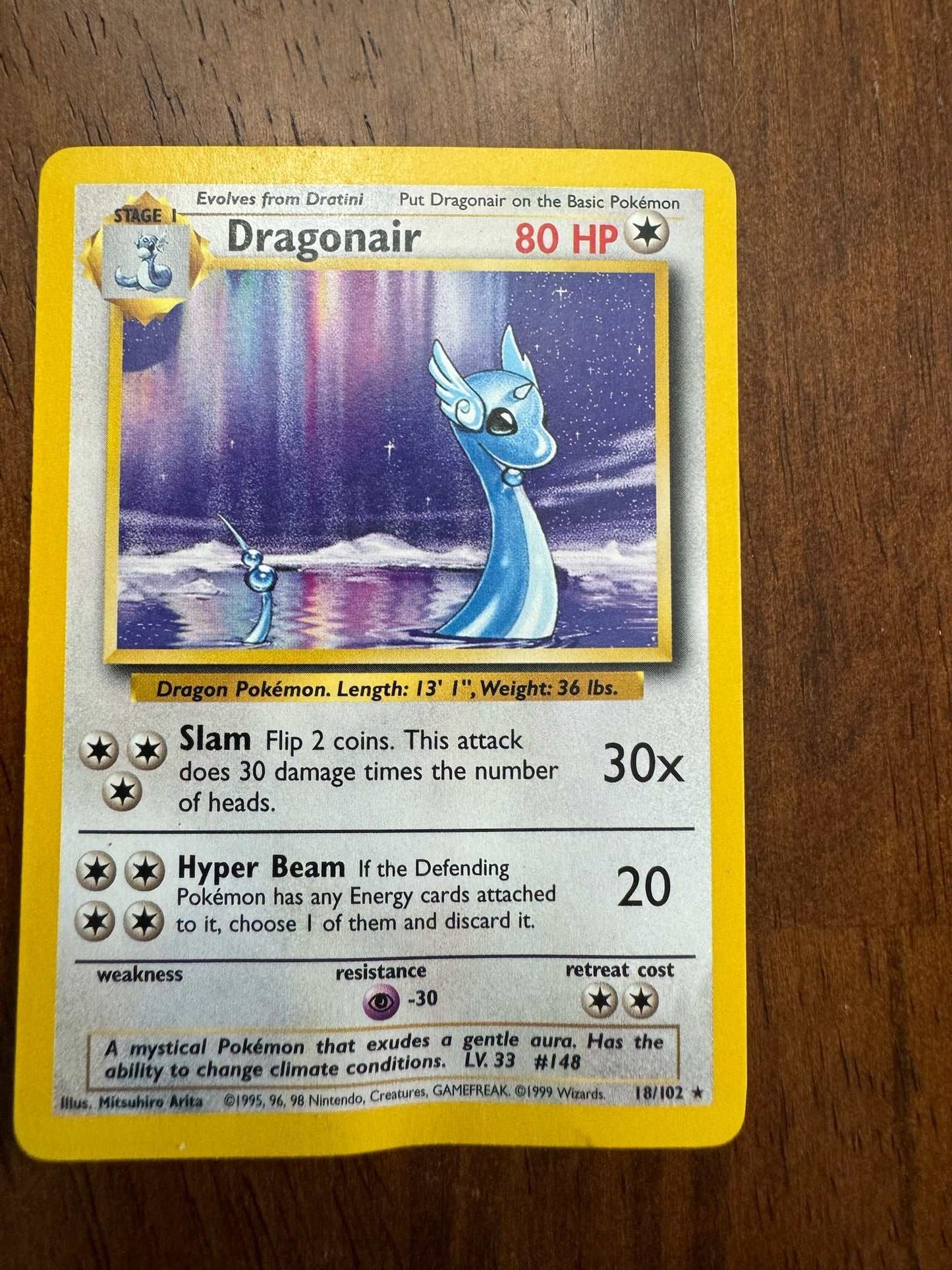 Base Set #018/102 Dragonair trading card with dragon design and rarity.