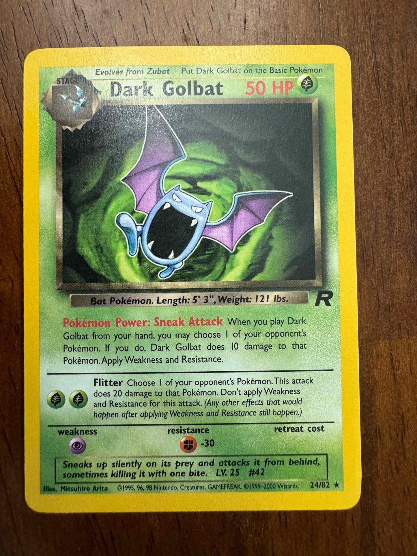 Team Rocket #24/82 Dark Golbat trading card with striking design for collectors.