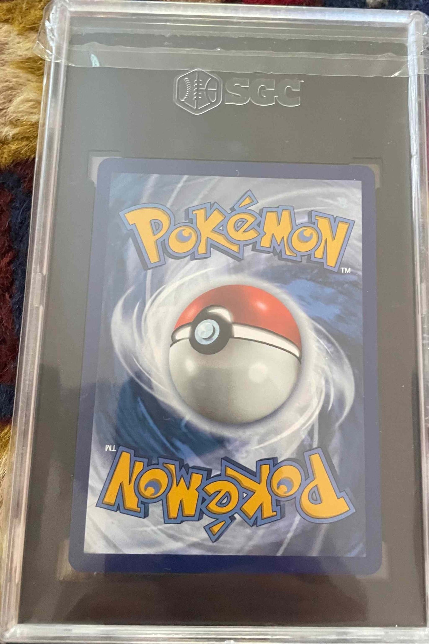 Evolving Skies #189/203 Umbreon V Alternate Art SGC 9.5 card in protective case.