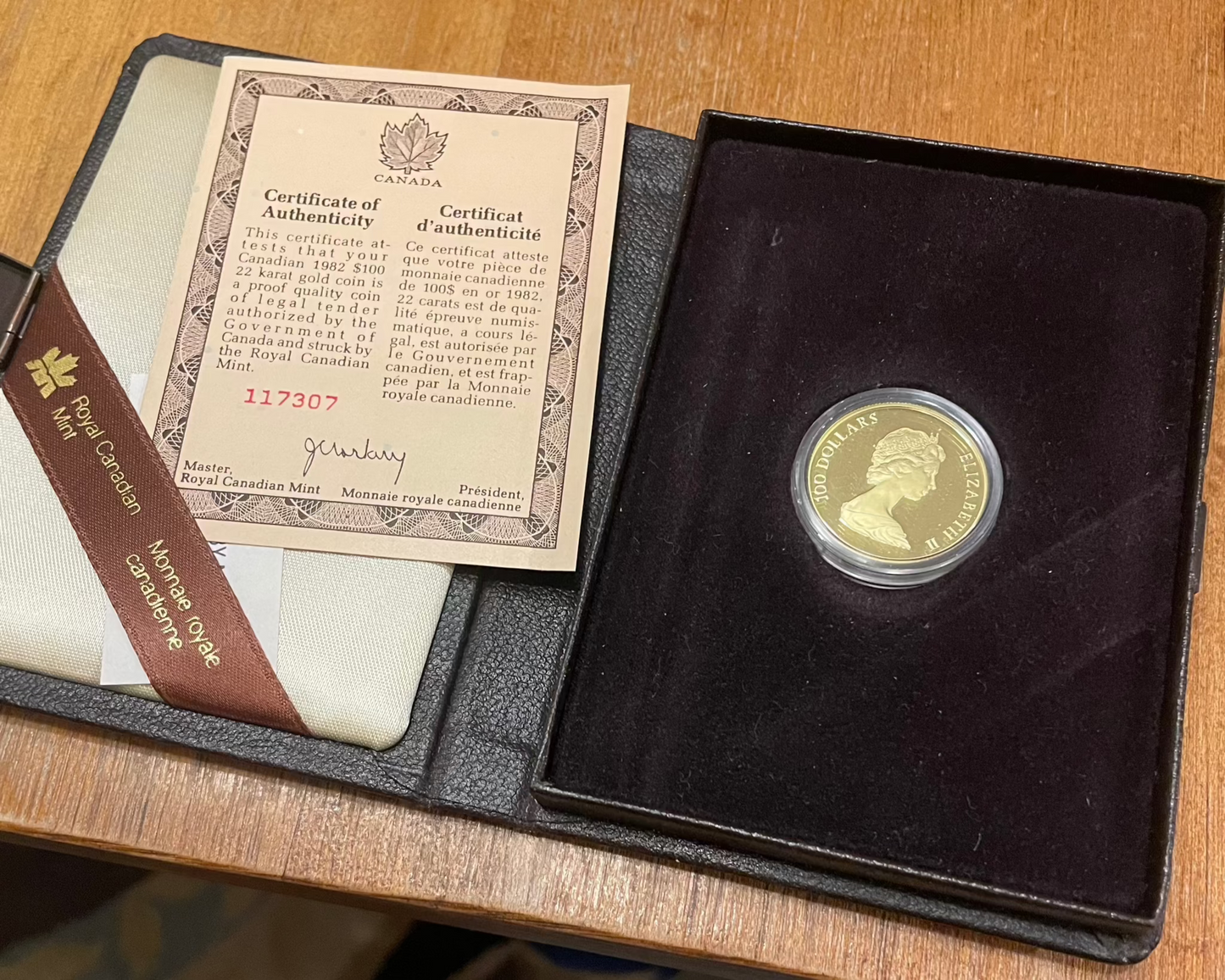 1982 RCM Canadian Constitution $100 Dollar 1/2 oz Gold Coin with display case and certificate of authenticity.