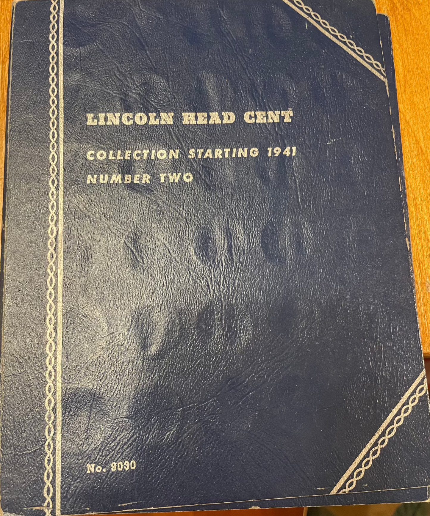 Collector's lot of Lincoln head cent book starting 1941, featuring near-mint steel cents bonus.