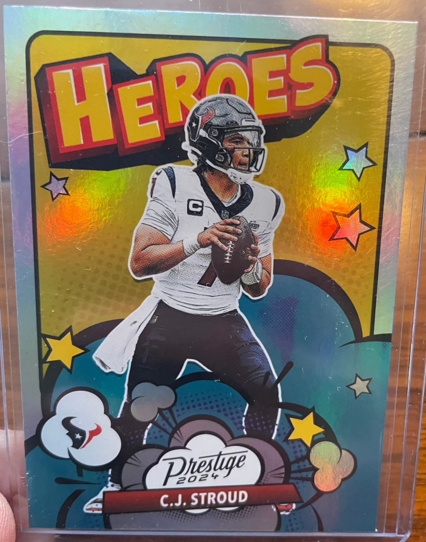 Stroud 2024 Panini Prestige Heroes 2 Houston Texans card featuring vibrant design.