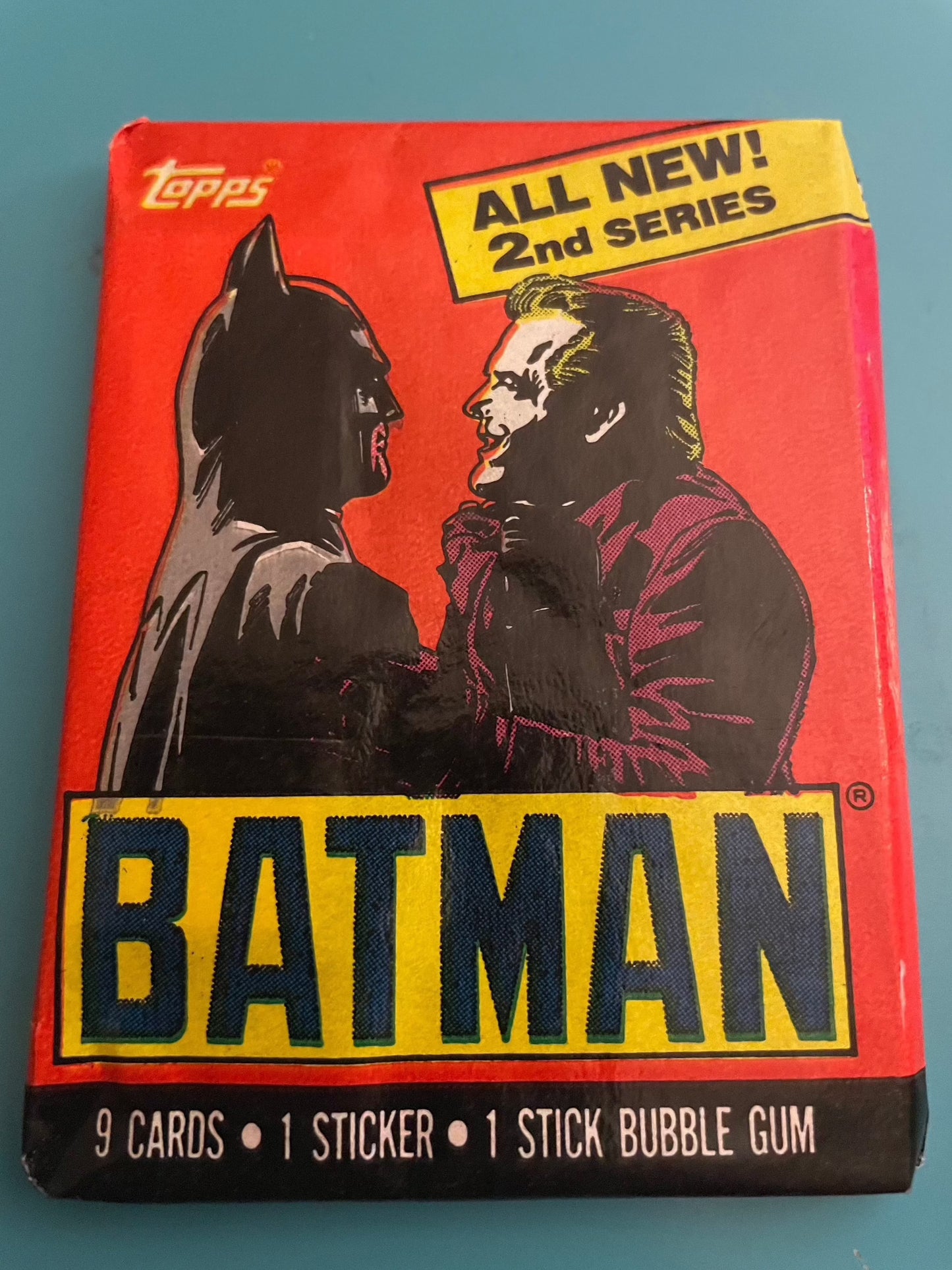 1989 Topps Batman sealed wax pack, 9 cards, 1 sticker.