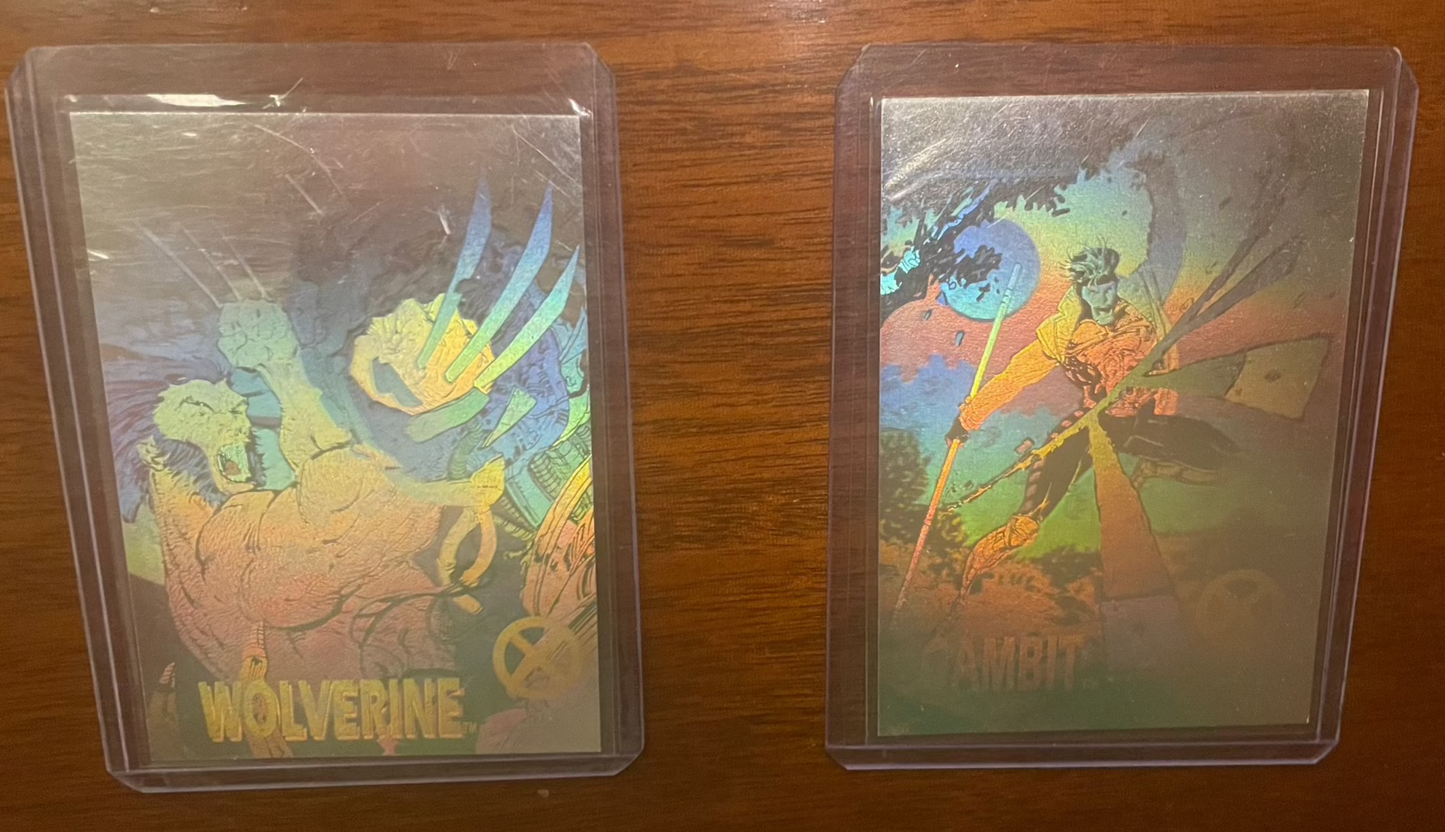 1992 Impel Marvel Universe Hologram Cards Gambit and Wolverine in protective sleeves.