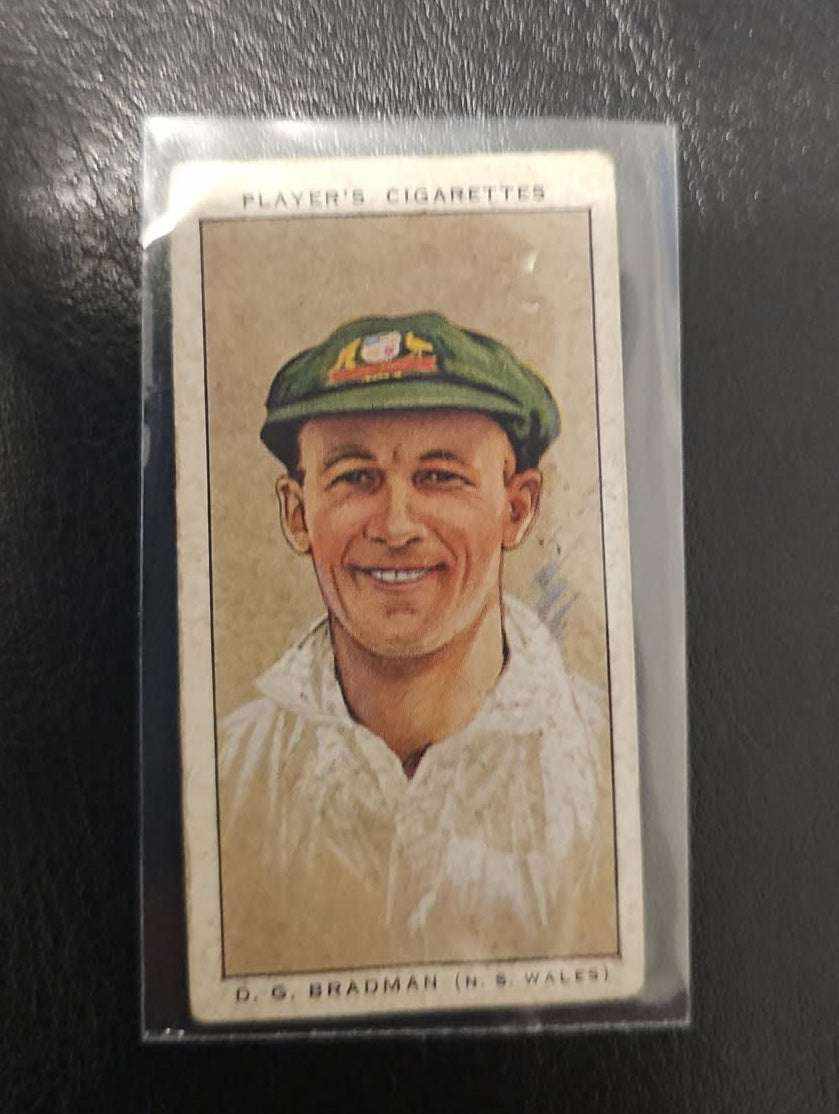 1934 Player's Cricketers Tobacco card featuring Don Bradman, rare cricket collectible.