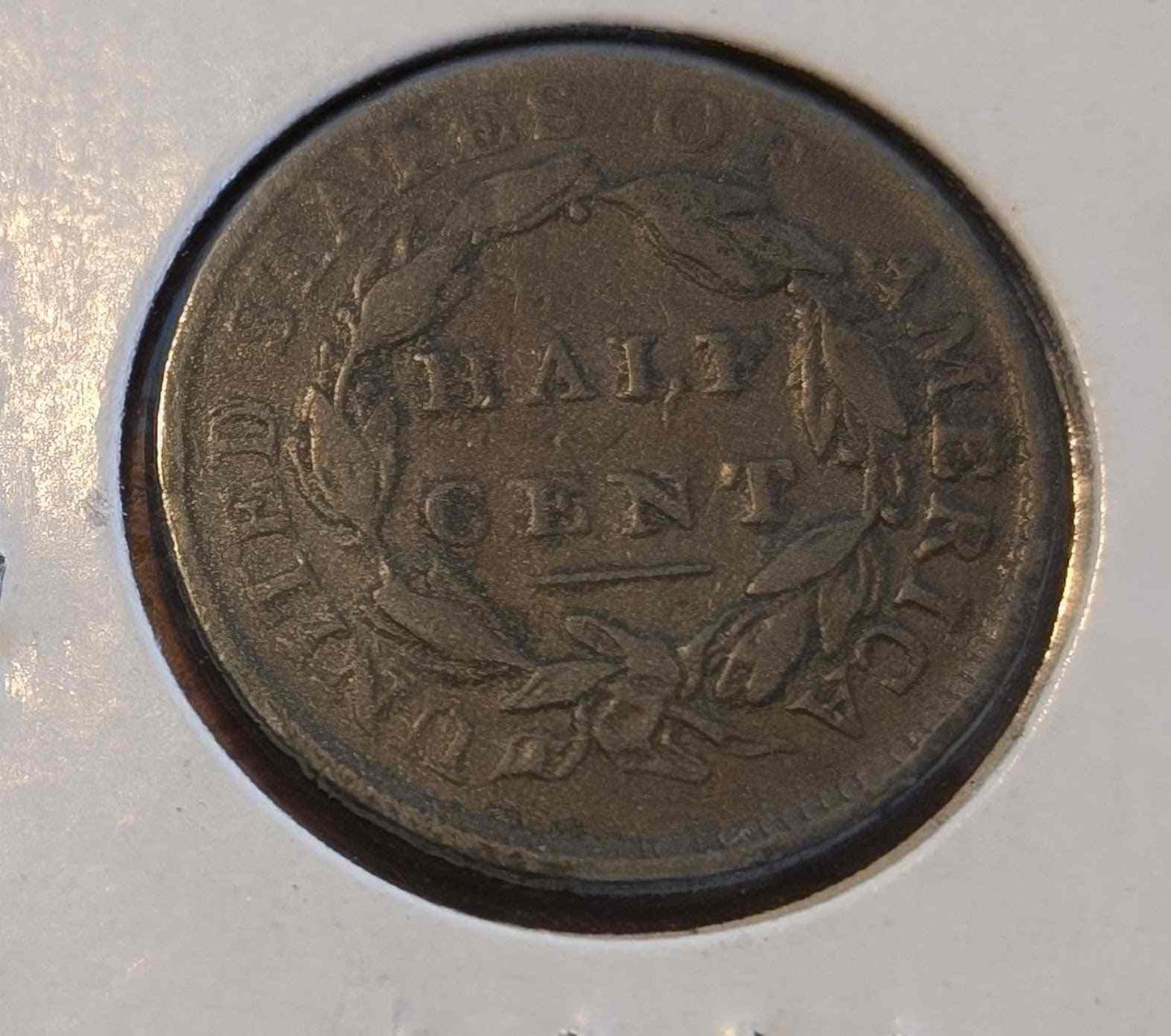 1809 Classic Head Half Cent coin featuring a timeless design.