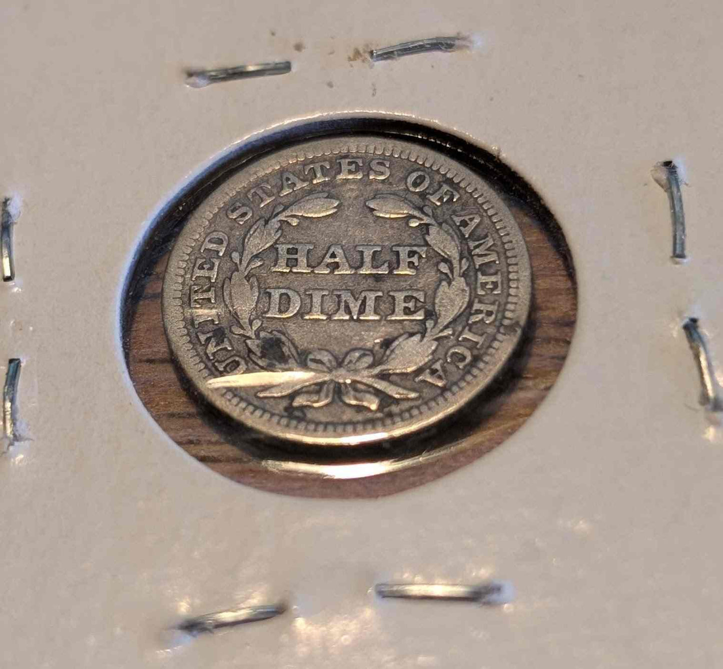 1853 Liberty Seated nickel with arrows, collectible silver coin.