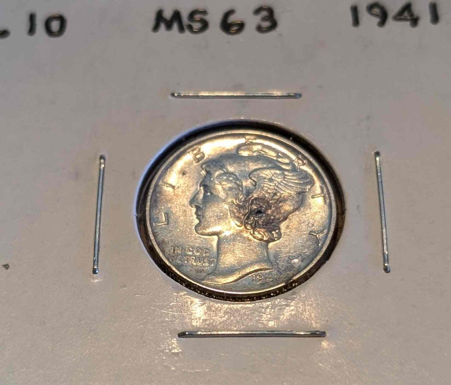 1941 Mercury Dime in 90% silver coin, collectible item.