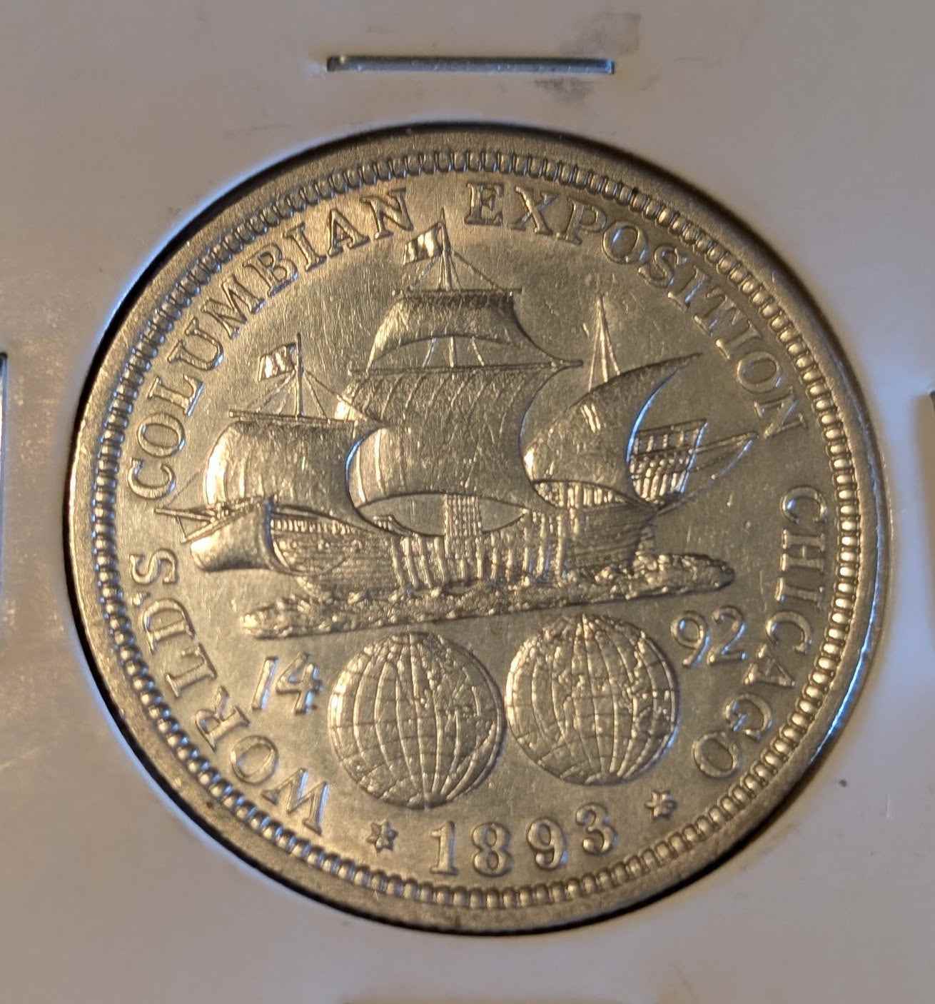 1893 Columbian Half coin commemorating Columbus's voyage, ideal for collectors.
