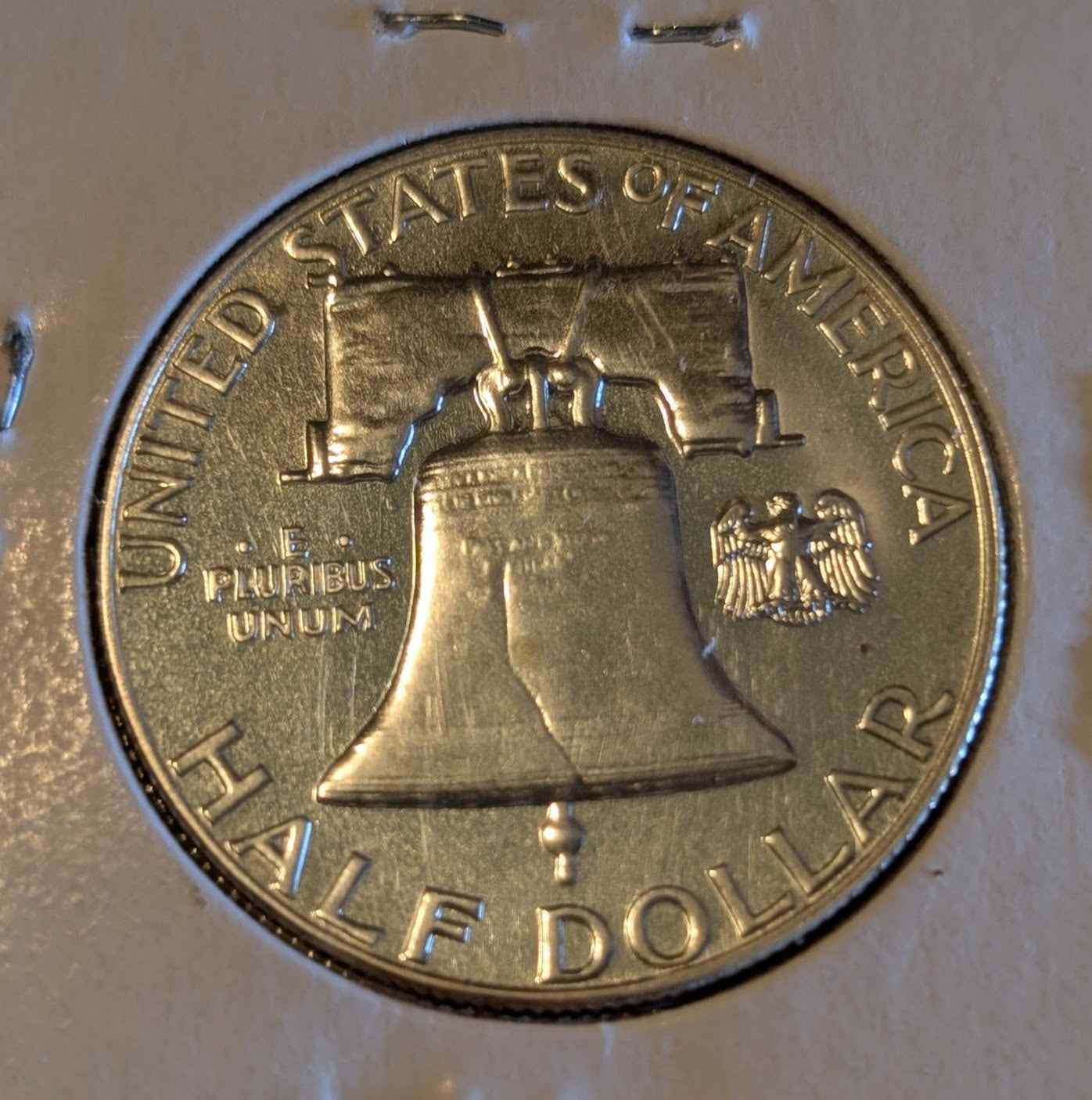 1962 Franklin Half Dollar coin with Liberty Bell design, 90% silver.