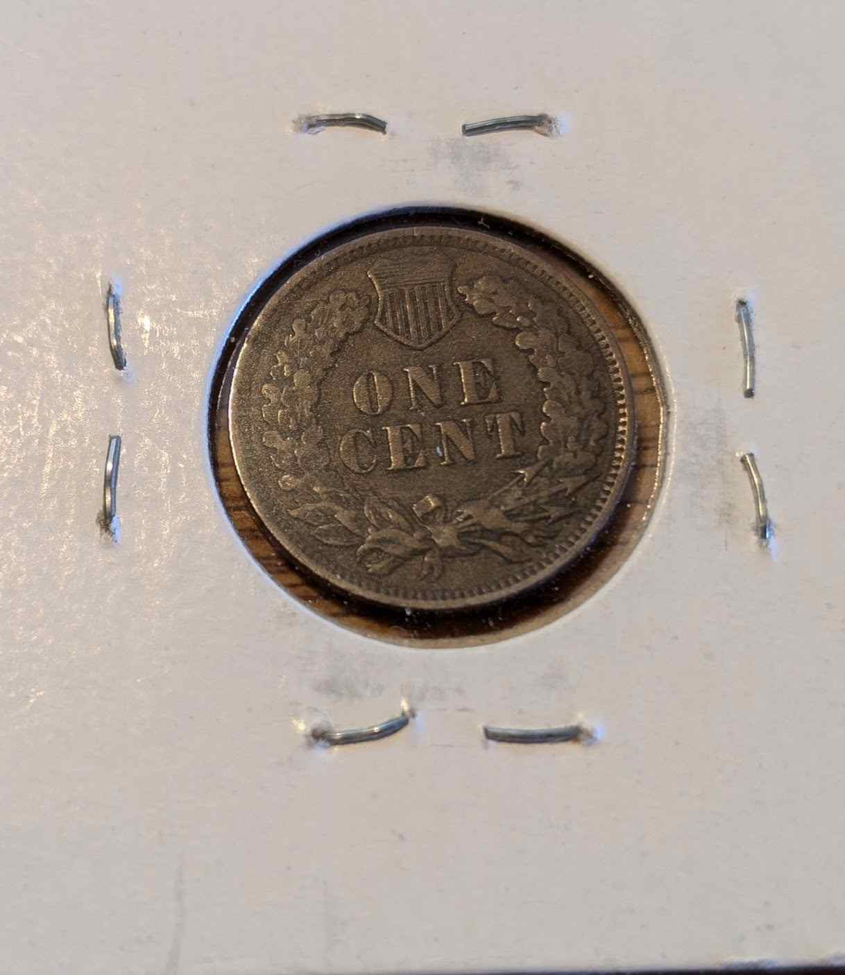 1903 Indian Head Cent coin with intricate design, collectible American heritage.