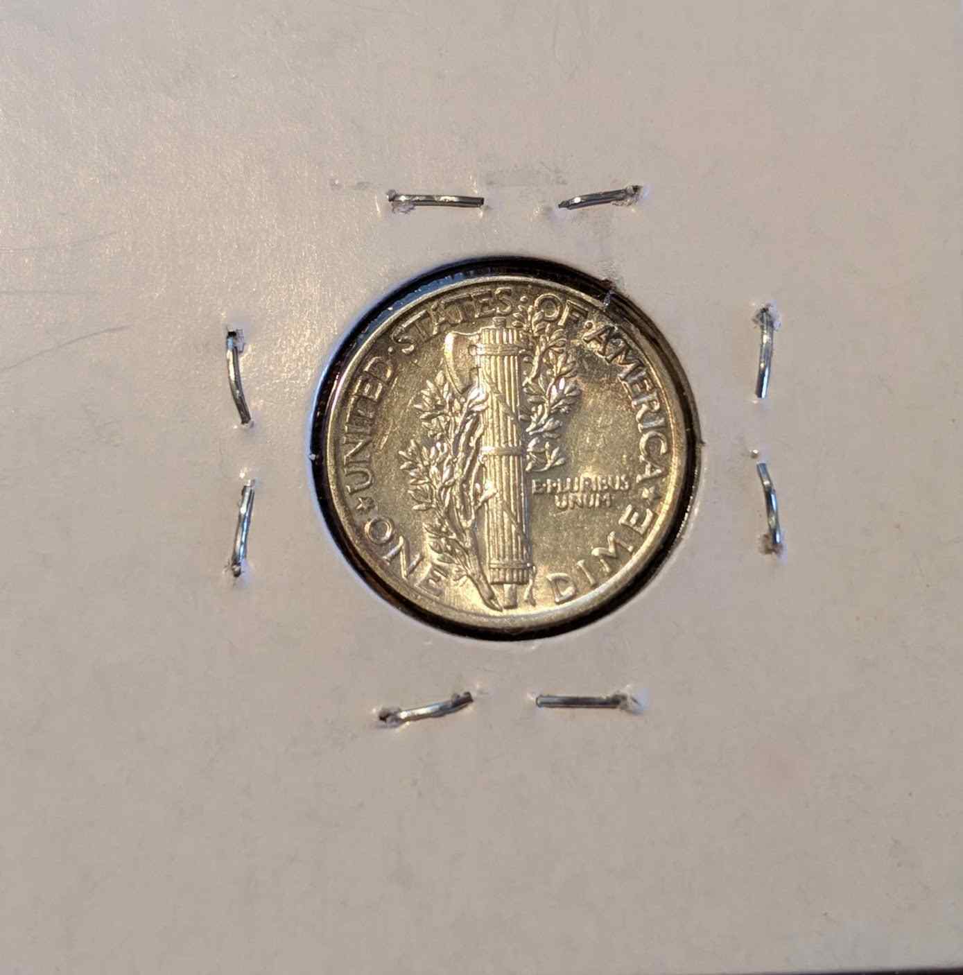 1941 Mercury Dime, 90% silver collectible coin.