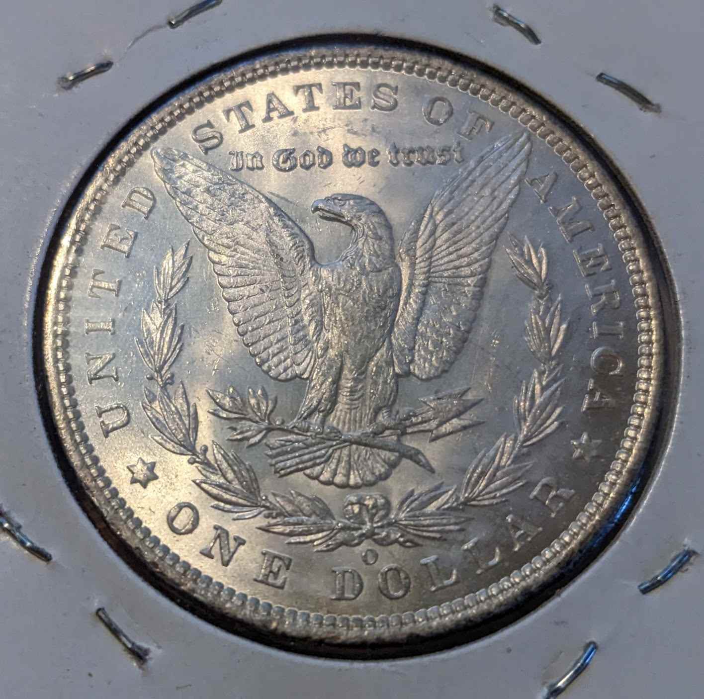 1885 O Morgan Silver Dollar, Brilliant Uncirculated quality, featuring iconic American design.