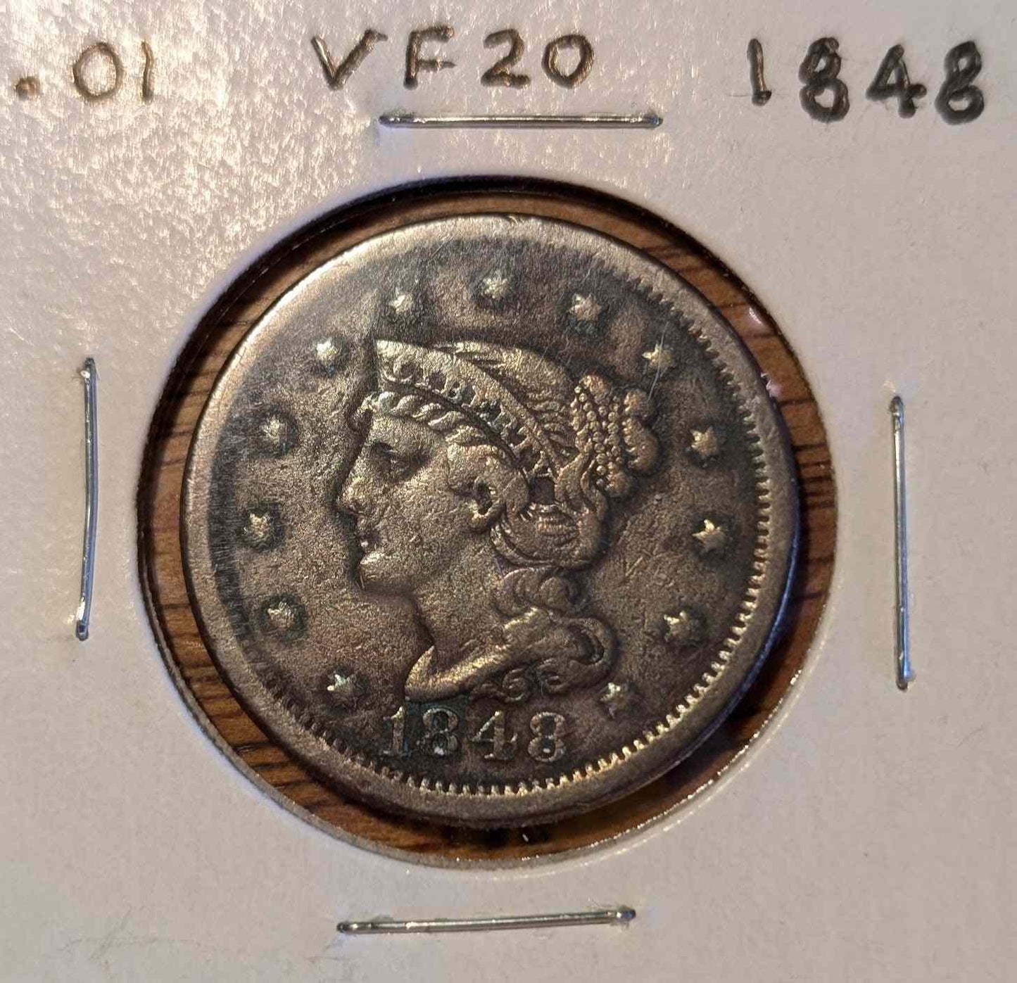 1848 Braided Hair Large Cent coin, featuring intricate design and vintage charm.
