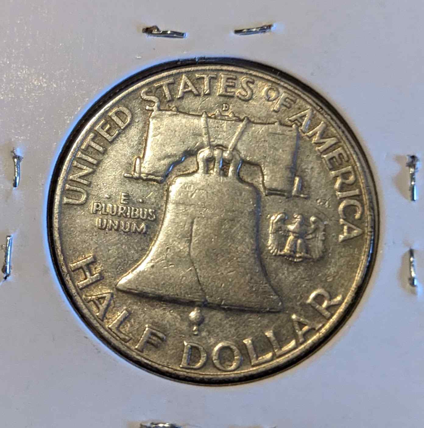 Lot of four Franklin Half Dollar coins featuring Benjamin Franklin and Liberty Bell, 90% silver, collectible set.