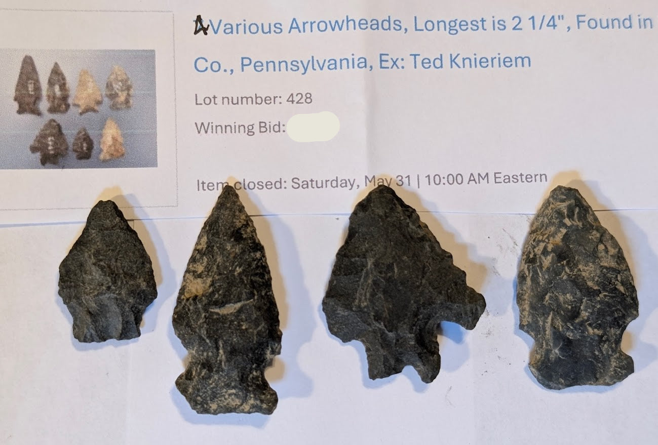 Group of 4 Native American arrowheads from Lancaster County, PA, made of dark chert, with lengths up to 2¼ inches, featuring distinct shaping and minor edge chipping.