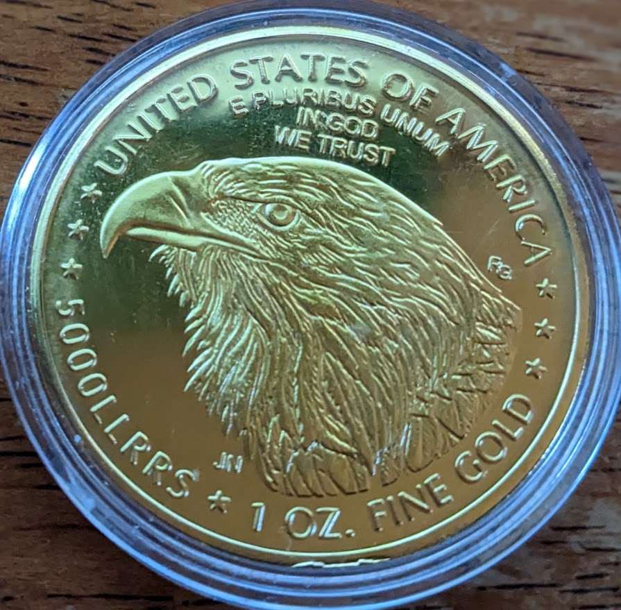 2024 American Liberty Eagle Tribute Round 1 oz gold-tone metal coin with eagle design in protective capsule