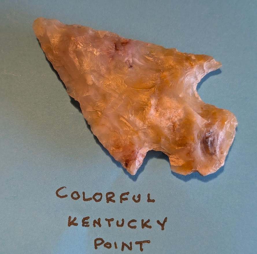 Colorful Kentucky translucent flint arrowhead with honey amber chalcedony tones, authentic Native American artifact