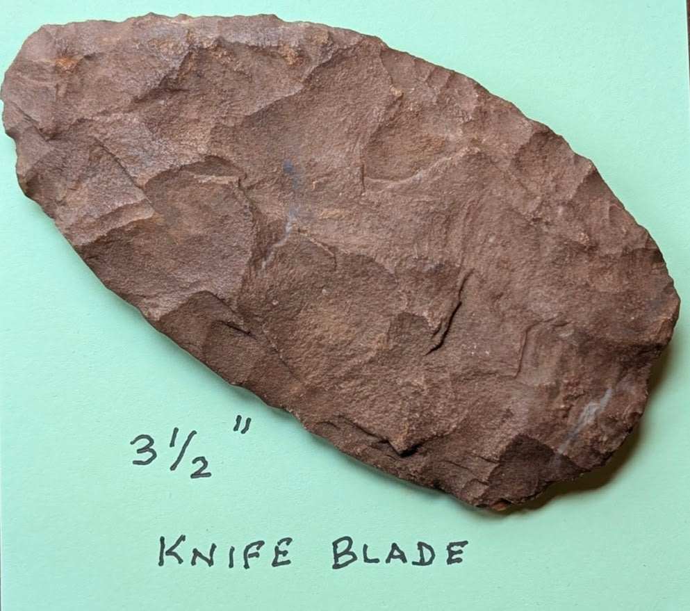 3.5-inch Native American flint knife blade with heavy percussion flaking and natural patina