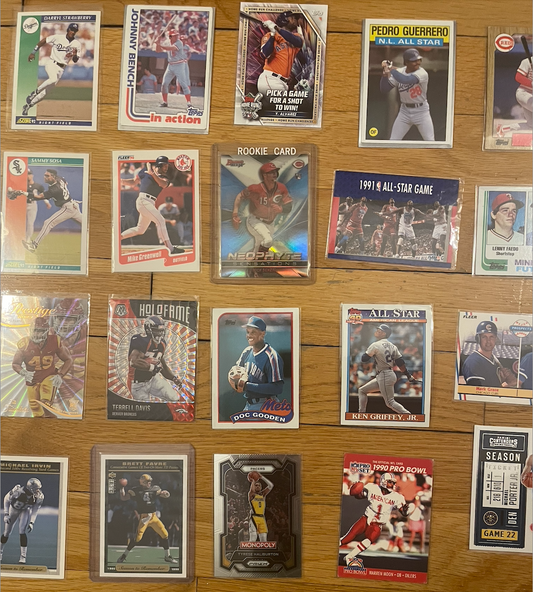 45-card trading card lot featuring sports legends, Marvel characters, rookie cards, and collectible inserts.