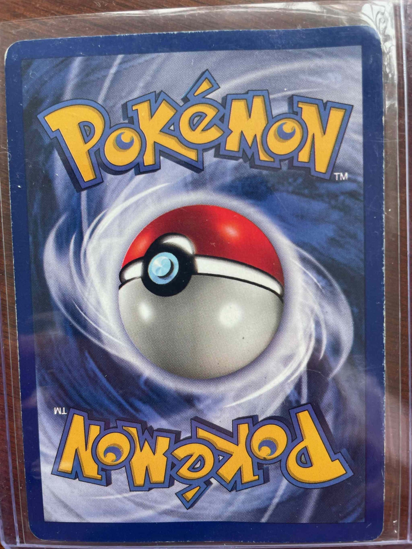 Base Set 2 #012/102 Ninetales Pokémon card with rare holographic finish.
