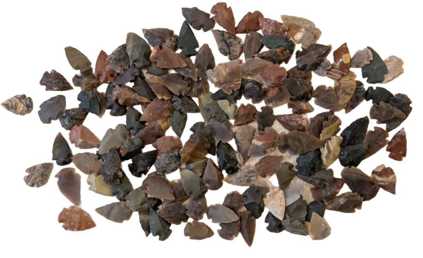 Collection of authentic Native American arrowheads in various shapes, sizes, and natural stone colors from the Northeastern US.