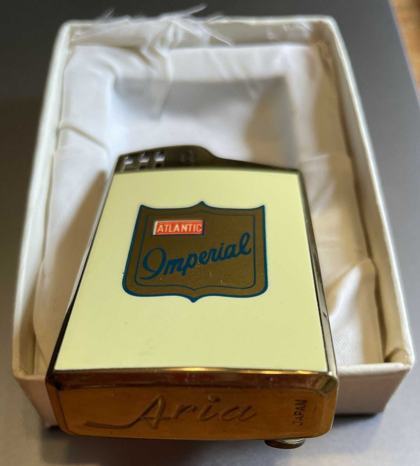 Rare 1960 vintage music box resembling a lighter in a decorative box.