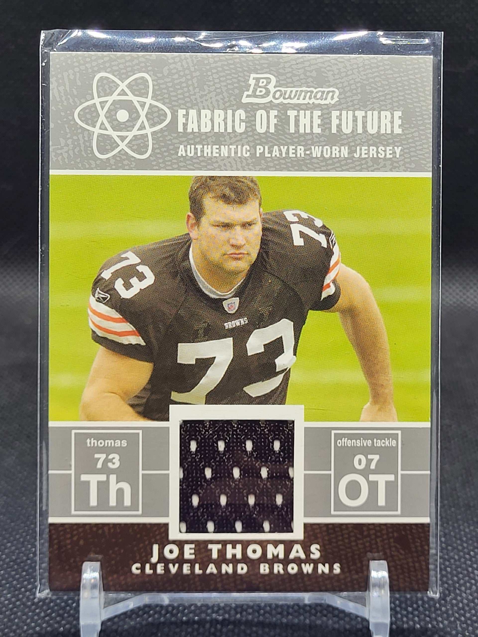 2007 Bowman Orange #FF-JT Joe Thomas Fabric of the Future football card featuring Cleveland Browns player.