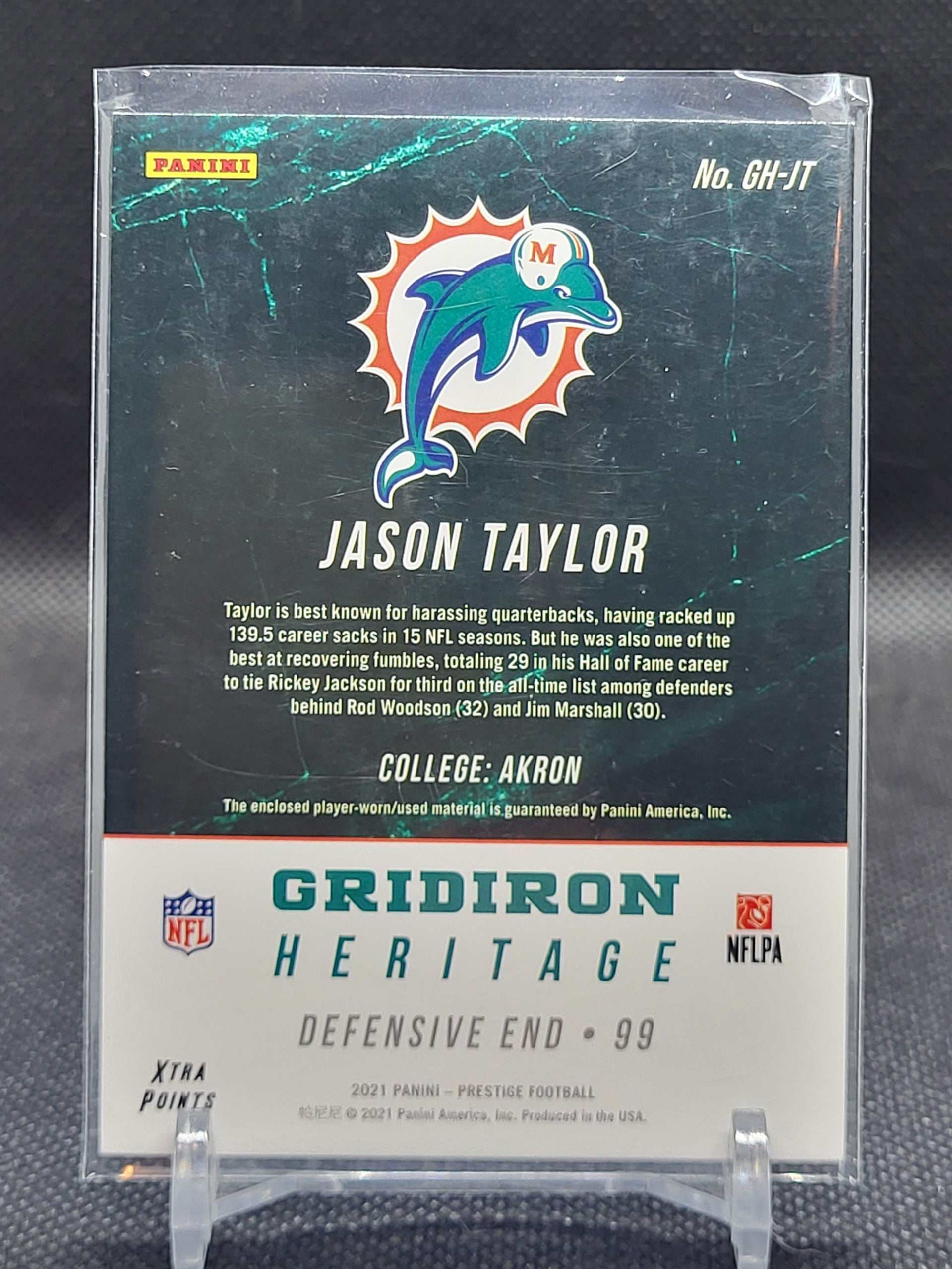 2021 Panini Prestige #GH-JT Jason Taylor Gridiron Heritage card featuring Miami Dolphins theme and player stats.